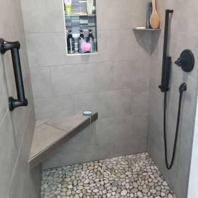 shower design with grey tiles